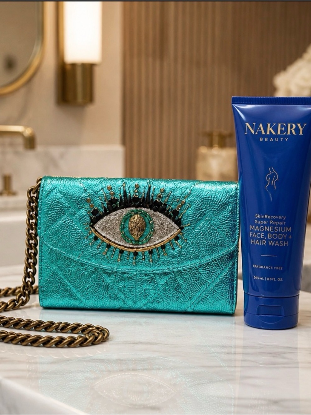 Kurt Geiger Turquoise Embellished Eye Crossbody Bag & Nakery body wash